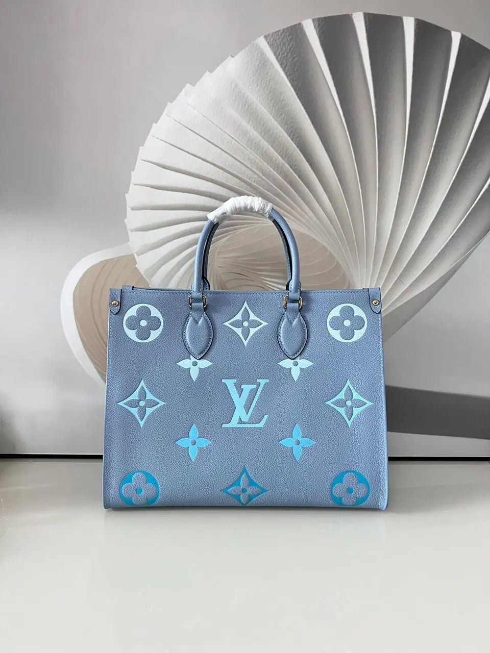 Louis Vuitton  Empreinte Monogram Giant By The Pool Onthego MM Summer M45718